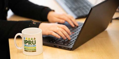 Working At Laptop Hot Drink Hero Img